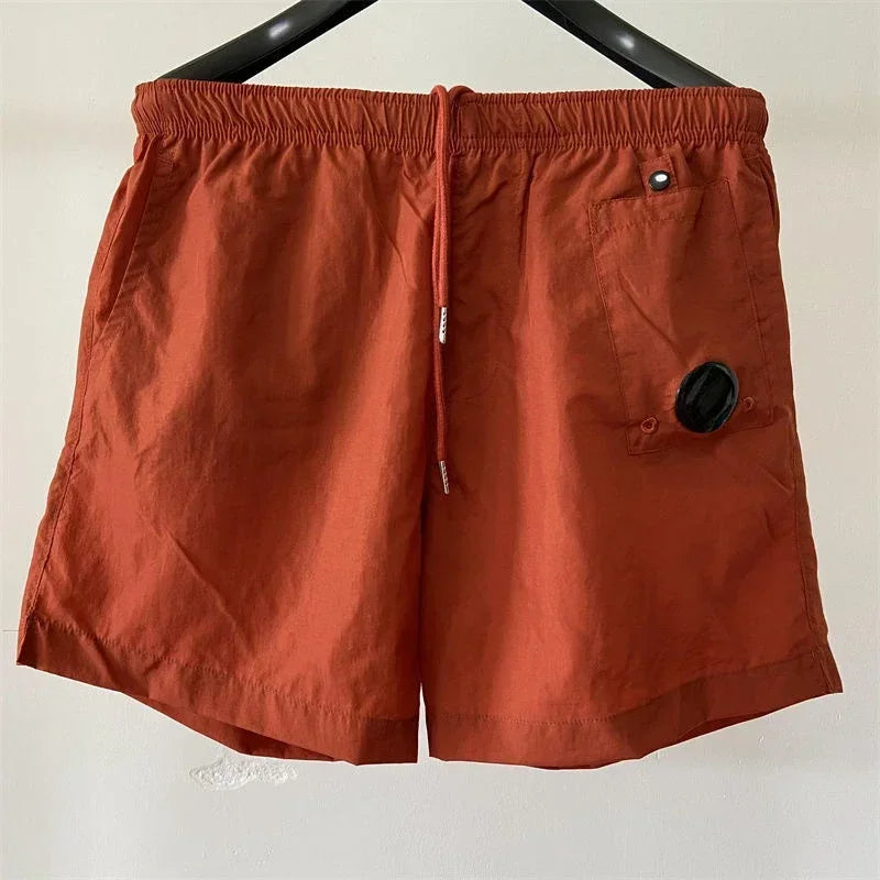 Top quality luxury knee-length summer youth leisure sports nylon shorts loose men's beach 5-point pants
