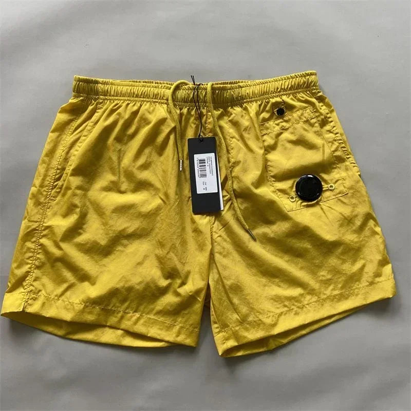 Top quality luxury knee-length summer youth leisure sports nylon shorts loose men's beach 5-point pants