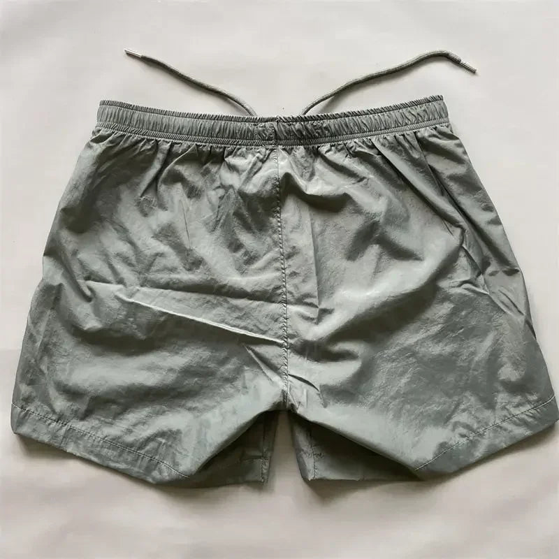 Top quality luxury knee-length summer youth leisure sports nylon shorts loose men's beach 5-point pants