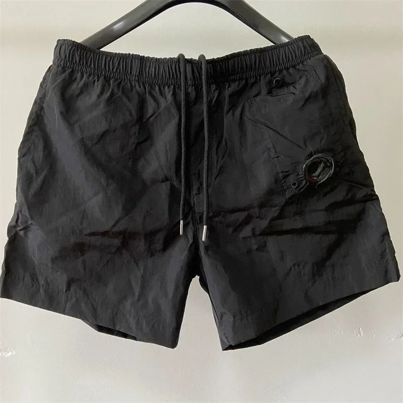 Top quality luxury knee-length summer youth leisure sports nylon shorts loose men's beach 5-point pants