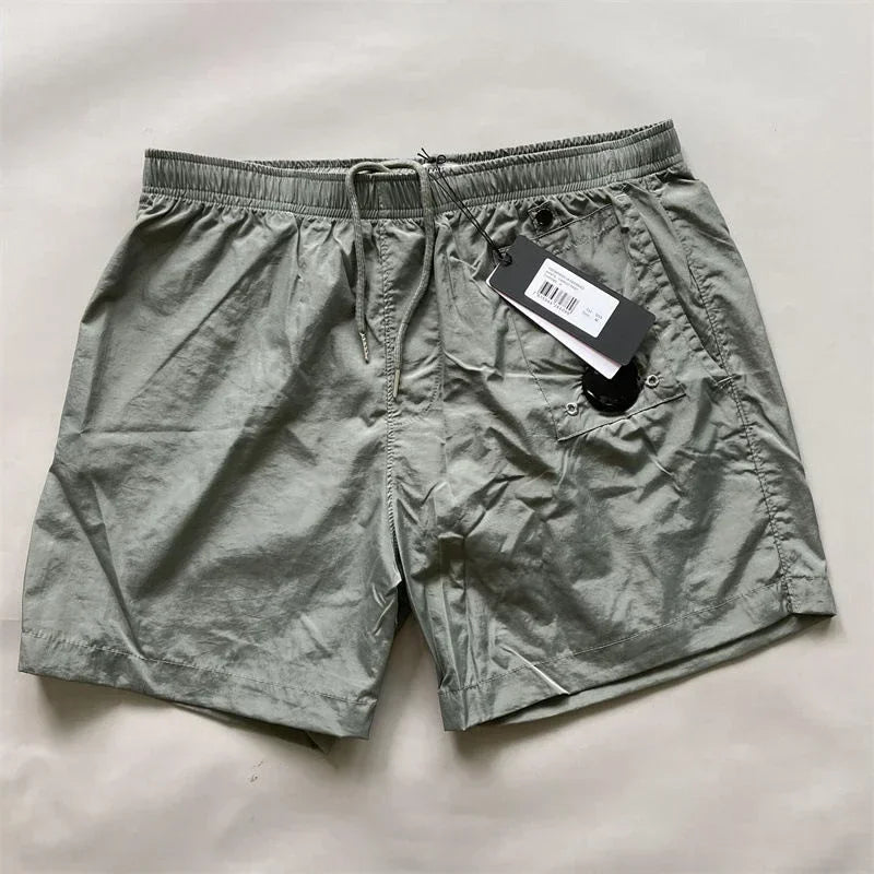 Top quality luxury knee-length summer youth leisure sports nylon shorts loose men's beach 5-point pants