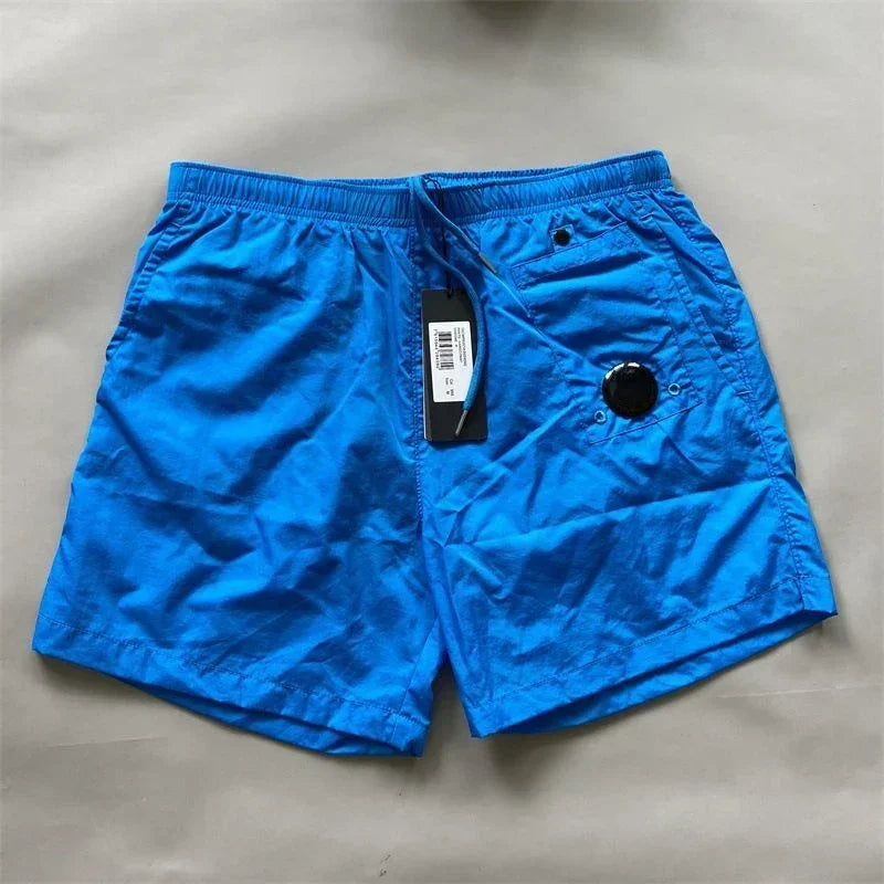 Top quality luxury knee-length summer youth leisure sports nylon shorts loose men's beach 5-point pants