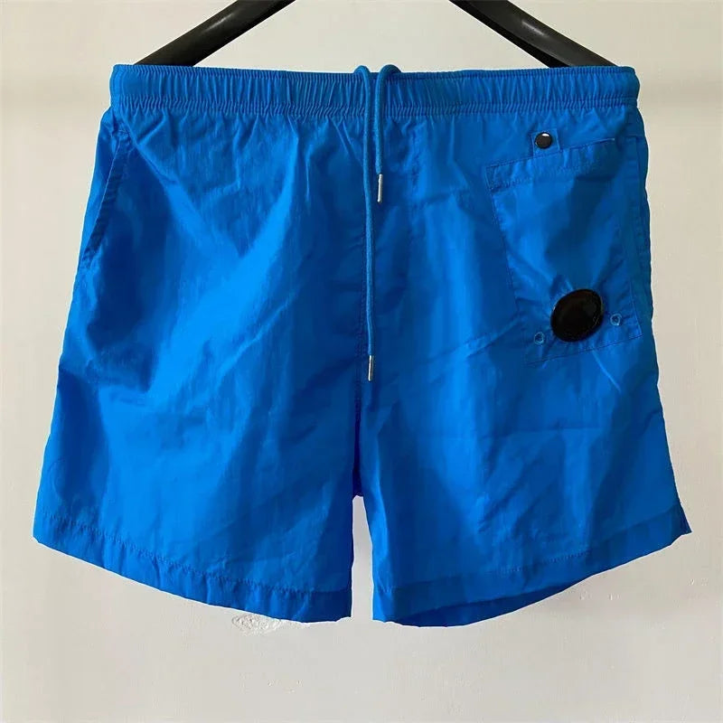 Top quality luxury knee-length summer youth leisure sports nylon shorts loose men's beach 5-point pants
