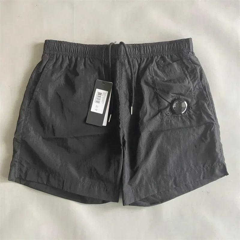 Top quality luxury knee-length summer youth leisure sports nylon shorts loose men's beach 5-point pants