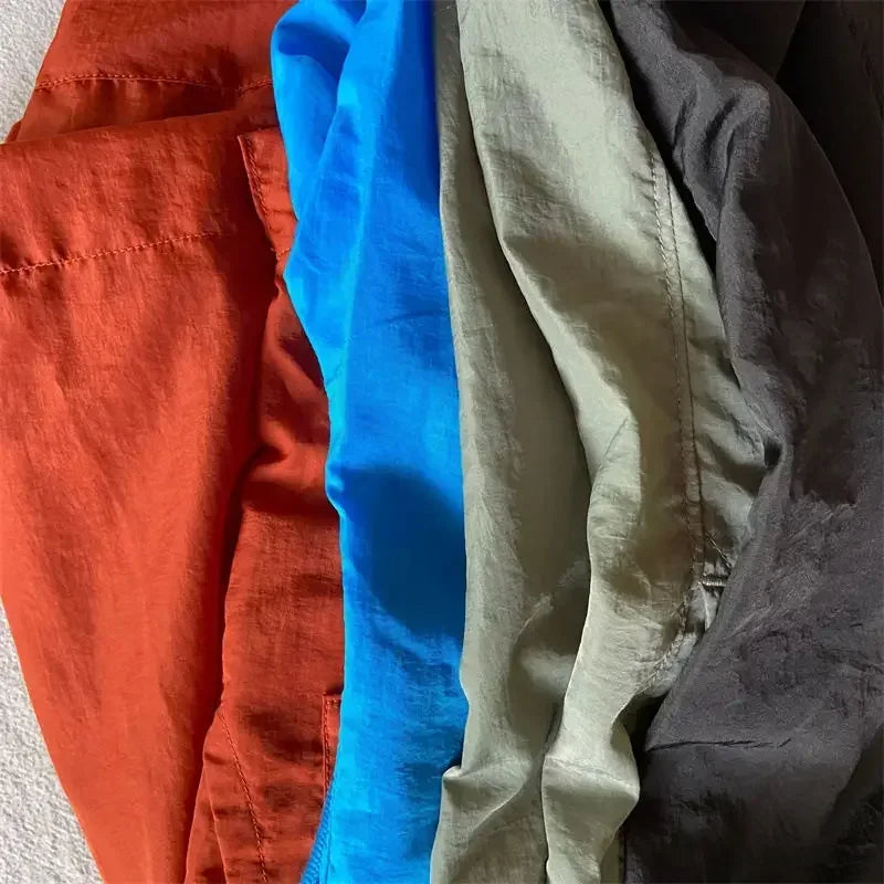 Top quality luxury knee-length summer youth leisure sports nylon shorts loose men's beach 5-point pants