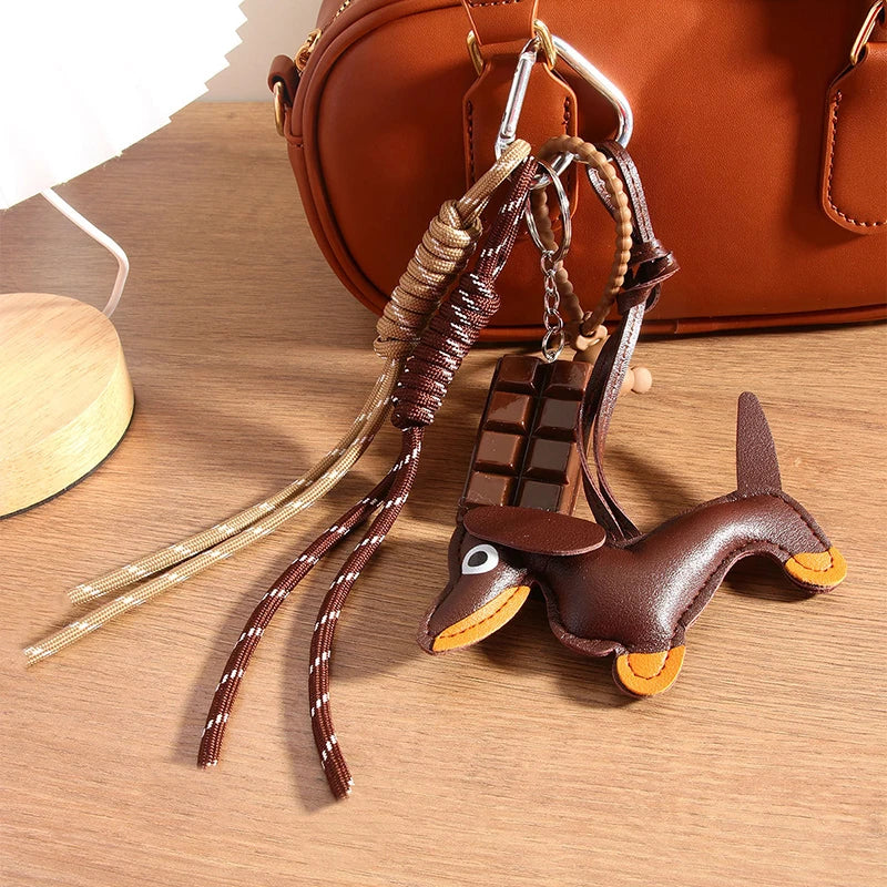 Vintage PU-Leder Dackel Welpe geflochtenes Seil Anhänger Schlüsselanhänger Mode Schokolade Schlüsselanhänger Damen Tasche Charms Schlüsselhalter Geschenke