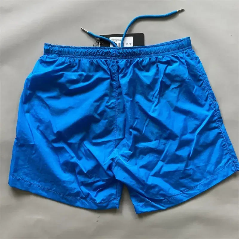 Top quality luxury knee-length summer youth leisure sports nylon shorts loose men's beach 5-point pants